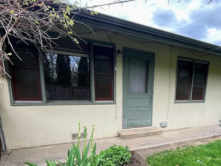 Backside of unit, opens up to quiet common area and gardens