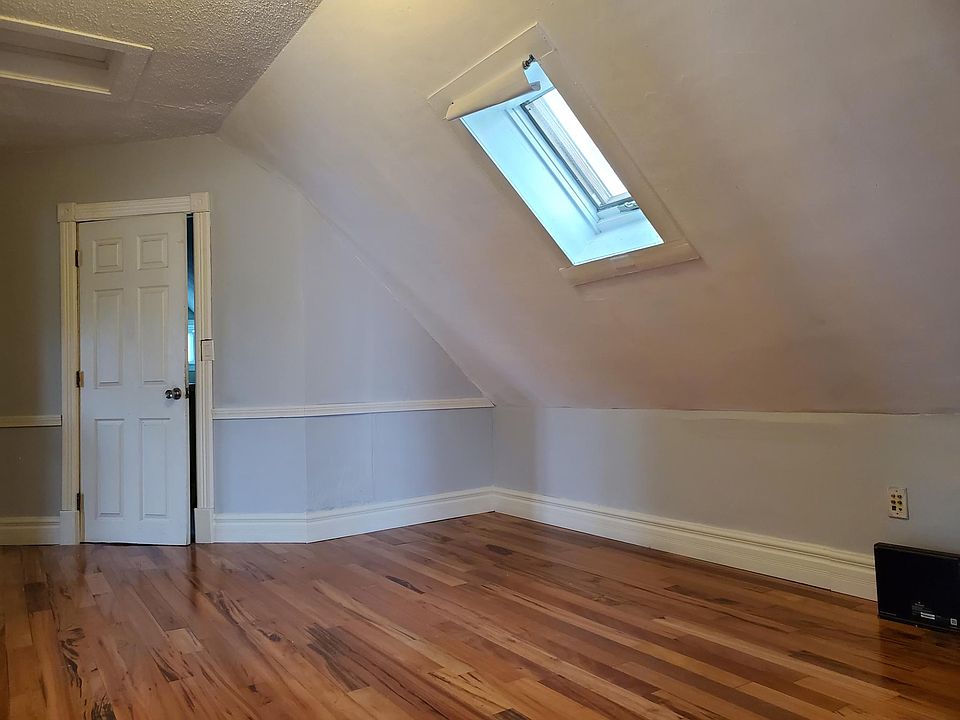 Freshly painted living room, hardwood flooring