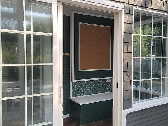 Entrance to porch and message board