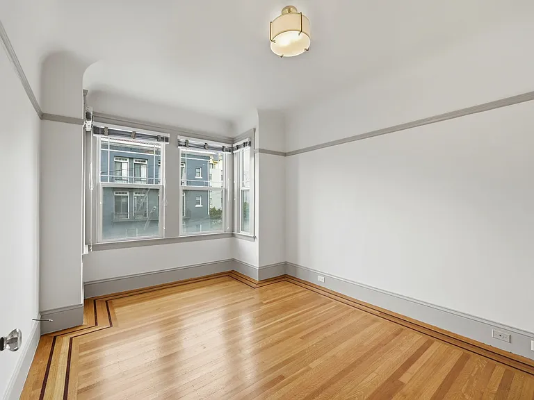2nd large and bright bedroom, with view to the front of the unit