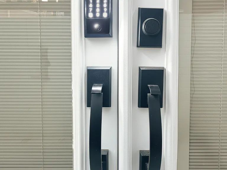 Close-up of smart lock entry for convenient phone access and guest passwords. The smartlock comes with a physical key as well.