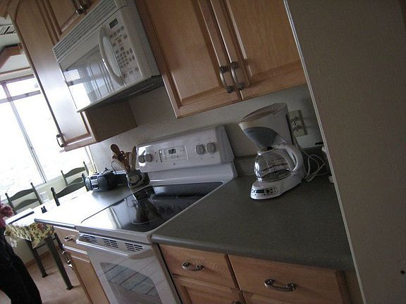 remodeled kitchen with new cabinets, counters & appliances