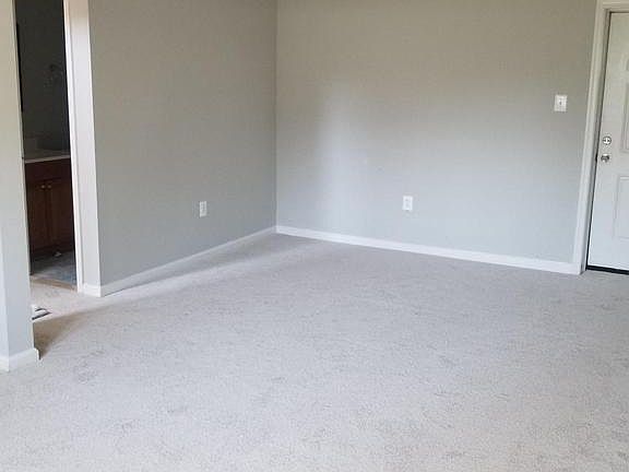 Freshly painted with new flooring throughout