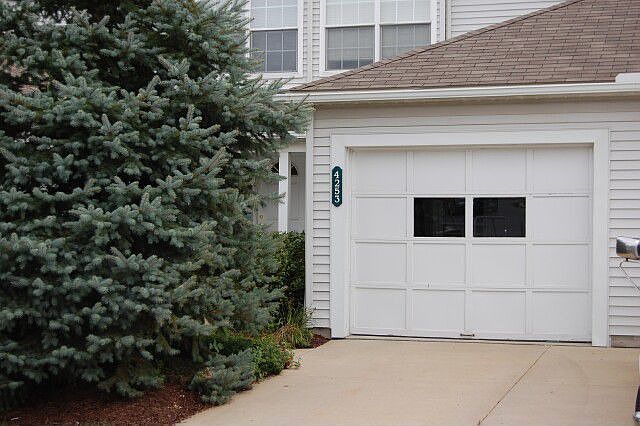 Private entrance with attached garage