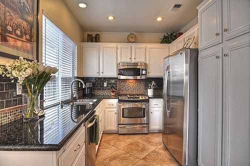 Gorgeous kitchen, granite counters,glass tile back splash,stainless appliances