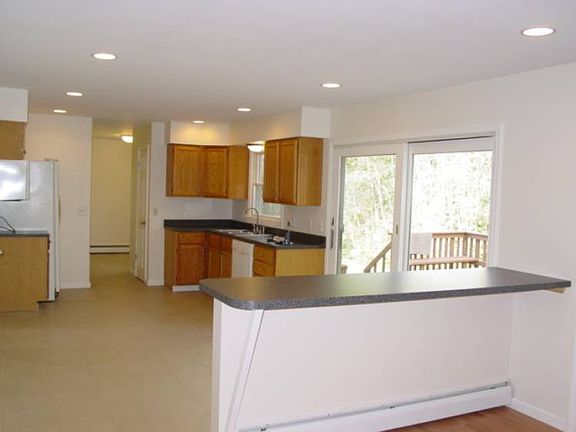 There is a nice buffet between the eat in kitchen and living room.