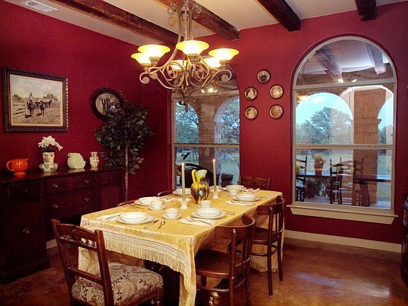 Dining with beamed ceiling