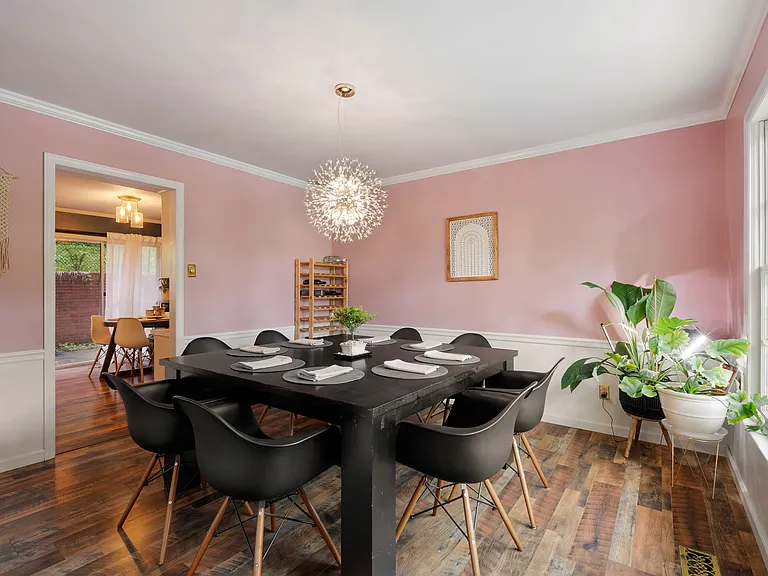 Dining room, with a glimpse of the kitchen nook
