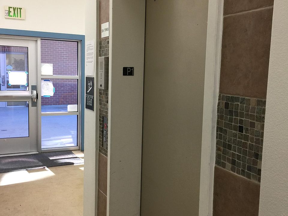 Elevator in building lobby area.