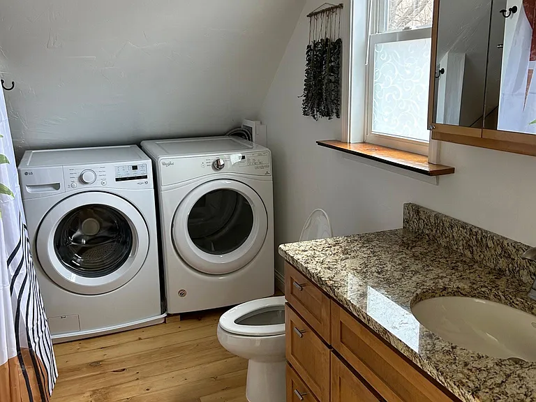 There's even a washer and dryer in the bathroom!
