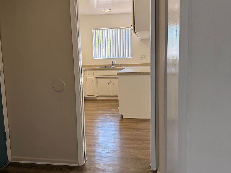 Entry hall with a coat closet.