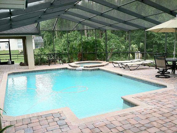 Pool with spillover spa