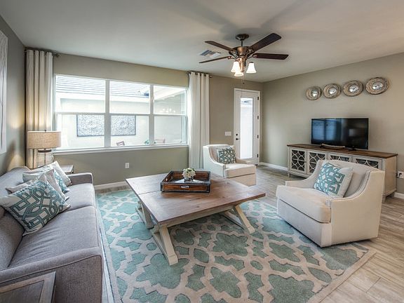 Model Representation Spacious gathering room with ample nature light