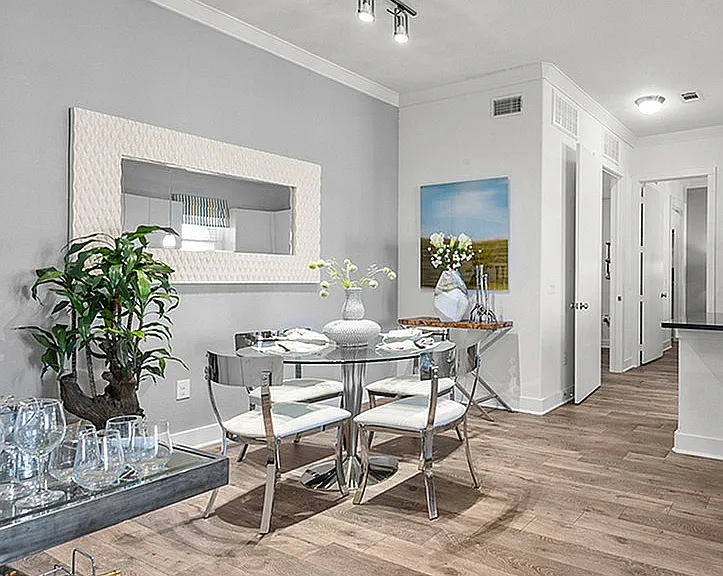 Experience dining in style with this chic and modern kitchen area. Experience dining in style with this chic and modern kitchen area.