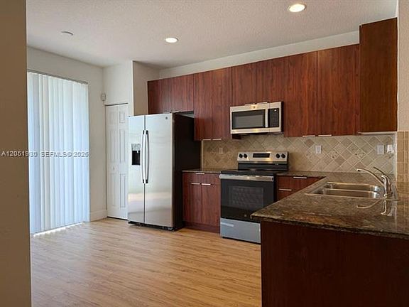 5th image of 14958 SW 41st Ln #Townhouse 14958