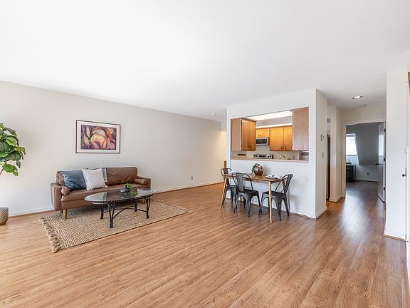 View of lower level upon entry; not pictured: coat closet to left of entryway