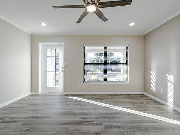 Front Entrance into open floor plan Livingroom
