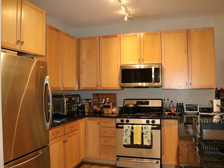 Chef-ready kitchen fully loaded with stainless steel appliances