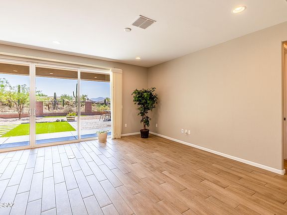 3rd image of 7693 W Laurel Ln