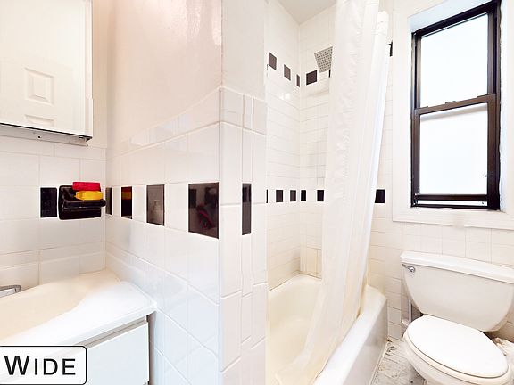 5th image of 176 E 3rd St APT 3G