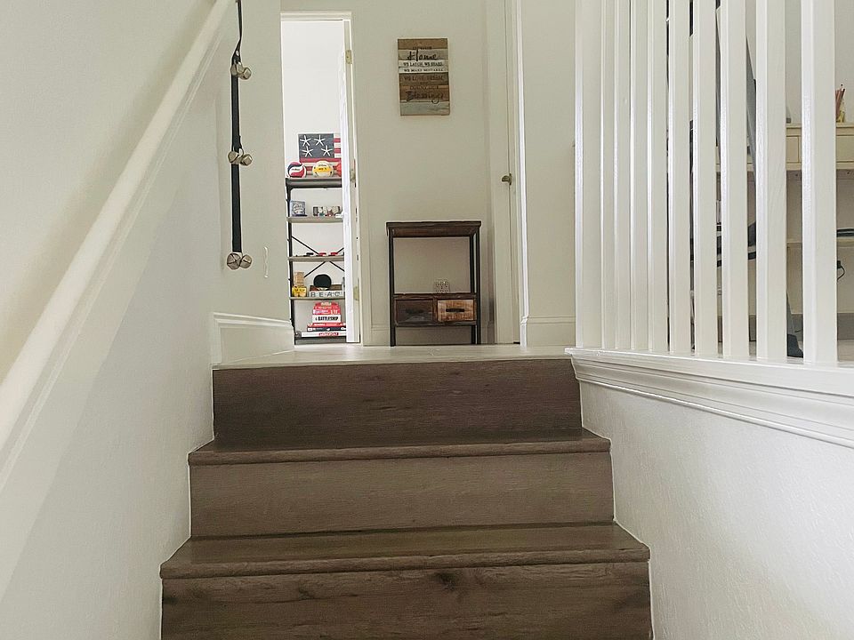 The office is seen straight ahead with the laundry room slightly to the right of the office