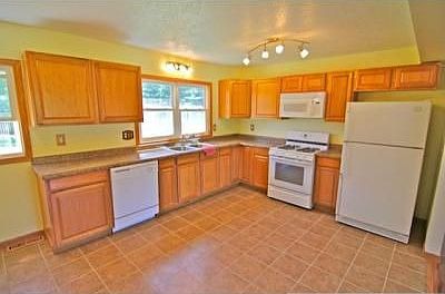 5th image of 6519 Dudley Ave N