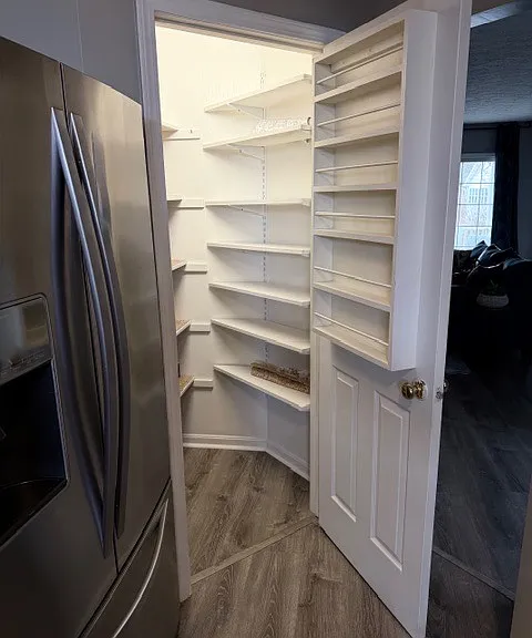 Walk-in kitchen pantry.