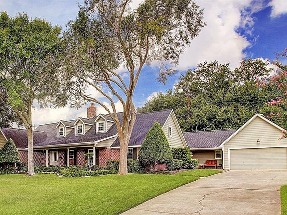 Stately 1 1/2 story with pristine attention to detail with all Hardy trim, on a large elevated lot with double driveway. Replaced double glass windows, beautiful curb appeal.