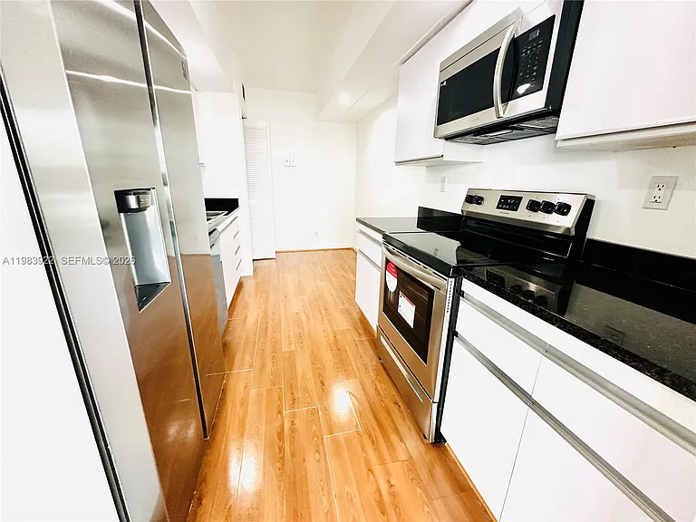 19707 Turnberry Way #5C — Photo 6