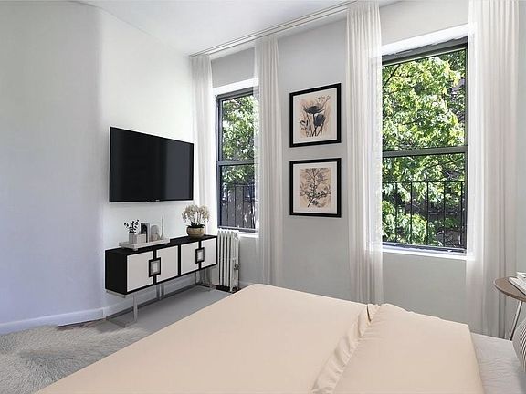 2nd image of 311 E 61st St APT 12