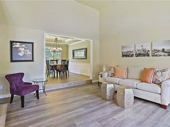 Spacious formal living room features with vaulted ceiling.
