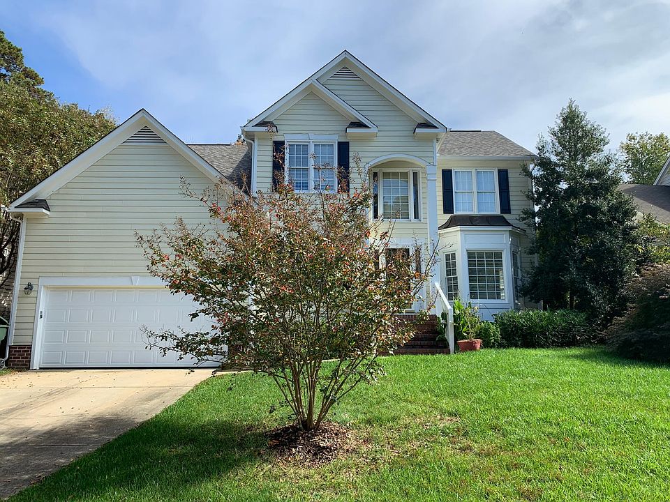Home features spacious 2 car garage with storage area
