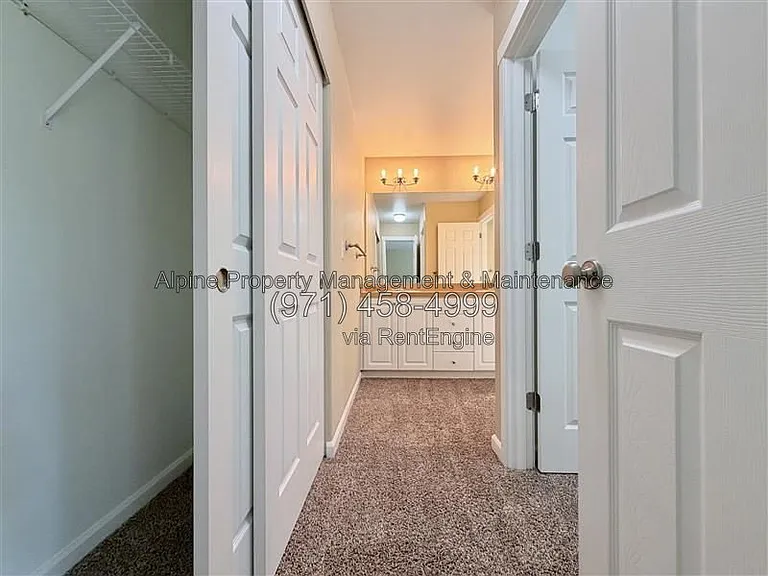5758 NE Damsel Dr — Photo 30