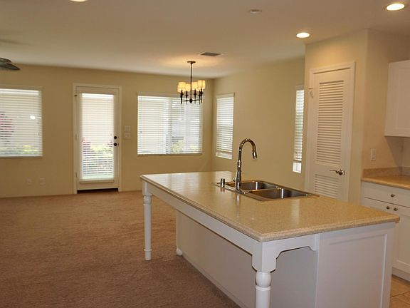 Spacious upgraded kitchen opens to living area