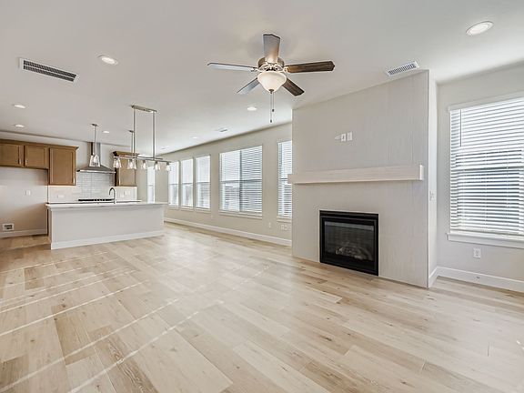 Plan C305 Representative Photo of the Living Room Kitchen