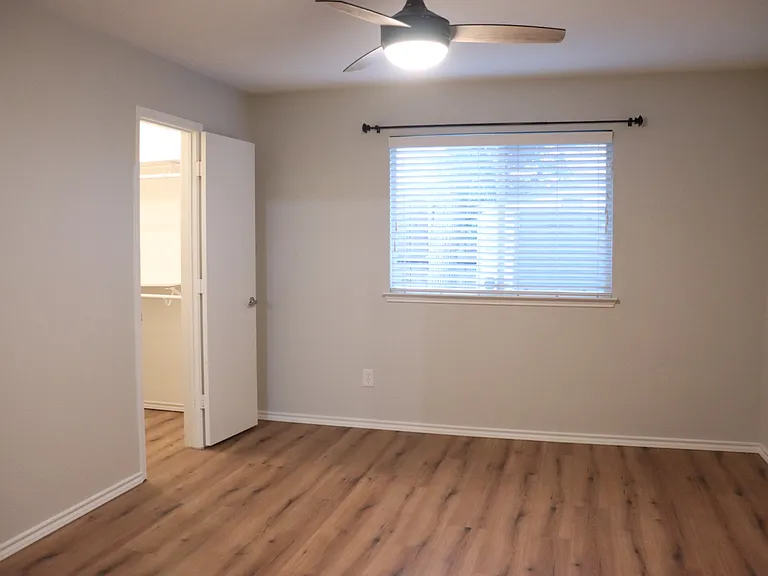 Master bedroom with walk in closet