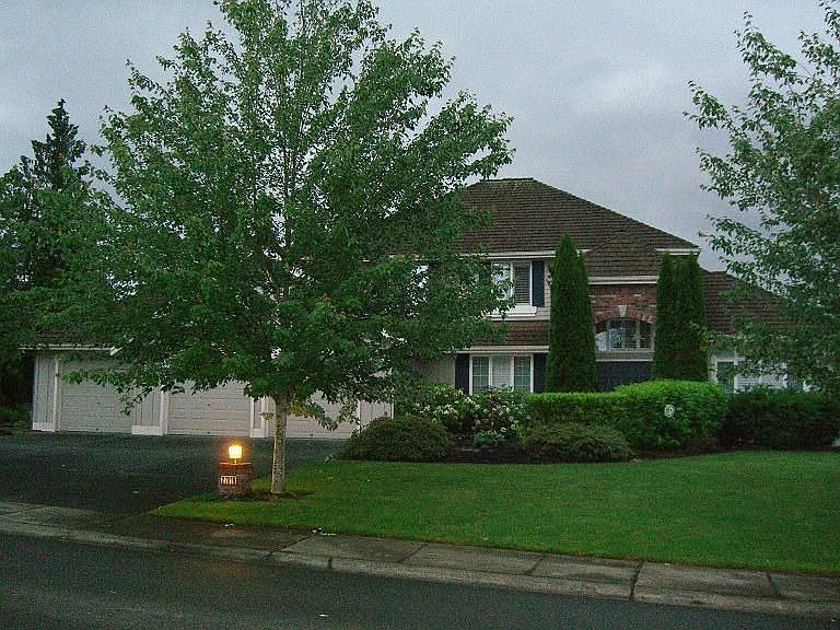 Quiet, low traffic street, well cared for lawn