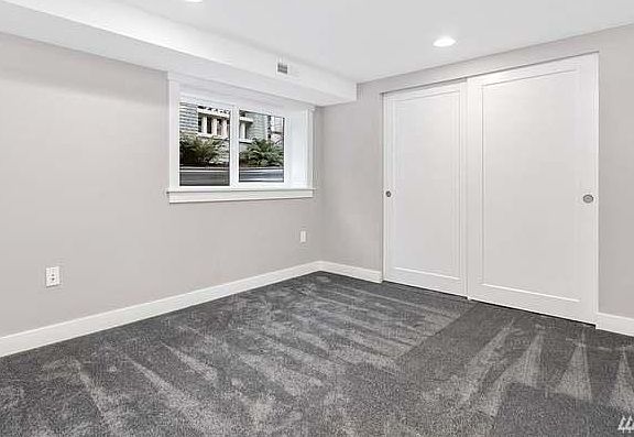 Bedroom with wall-to-wall closet