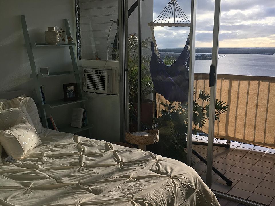 Master Bedroom, with ocean views and access to Lanai. Queen bed frame only included.
