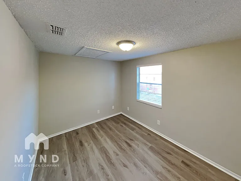 7606 Woodland Oaks Ct — Photo 12