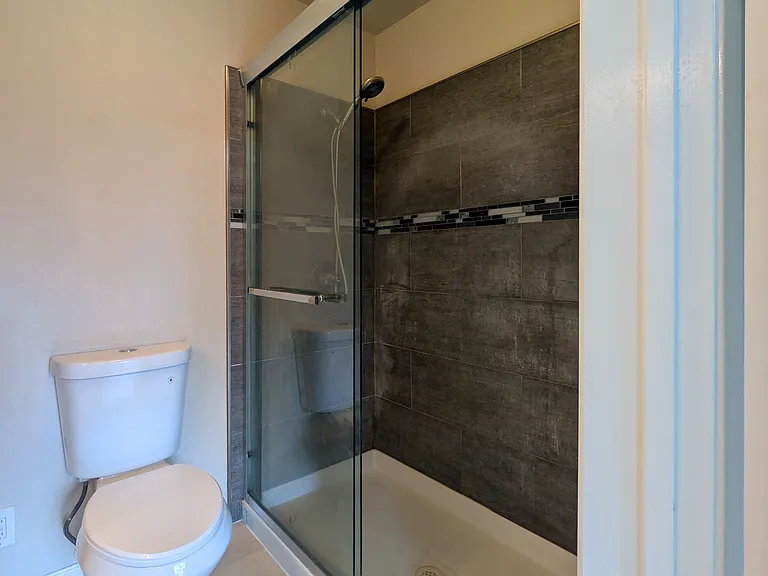 Primary bedroom 1, full bathroom with walk in shower