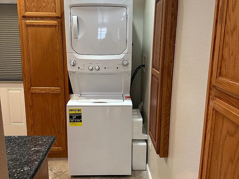 your very own washer & dryer / Laundry room with tons of cabinet space