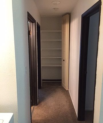 Carpeted Hallway Closet