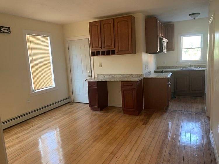 View of Living/Dining Room & Kitchen