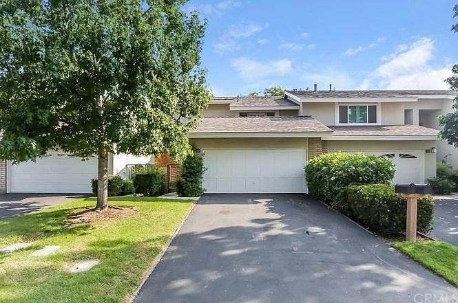 2 Car garage + 2 Cars on driveway + Guest parking