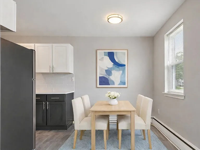 Welcome to Mt. Vernon Apartments, where modern elegance meets comfort. Enjoy a bright, inviting dining area and stylish kitchen perfect for entertaining. Elevate your living space today. Schedule a tour to see your future home!