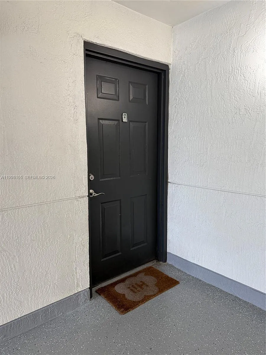 Building Photo - 4560 NW 107th Ave #202-12