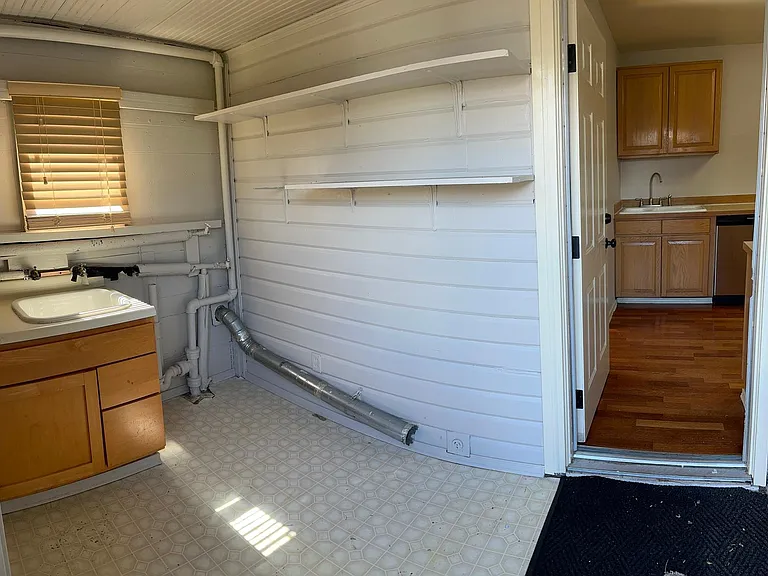 Laundry Area - With Washer and Dryer Hook ups