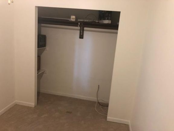 bedroom closet - doors removed for photo to show the size of the closet. Closet has sliding doors not shown