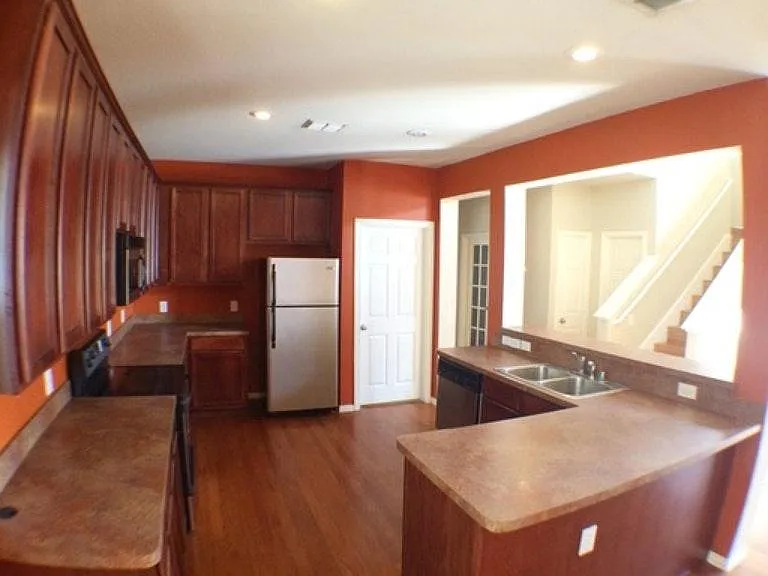 Old photo of the kitchen. The paint now is dark grey blue.